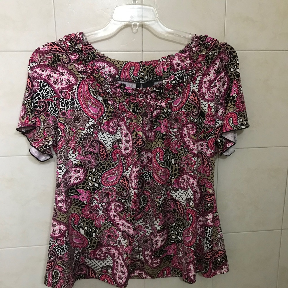 Ruching forms neckline of this feminine 1X blouse
